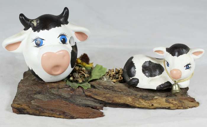 Cows on a tree stump