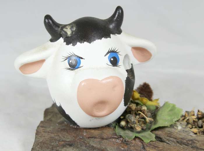 Cows on a tree stump