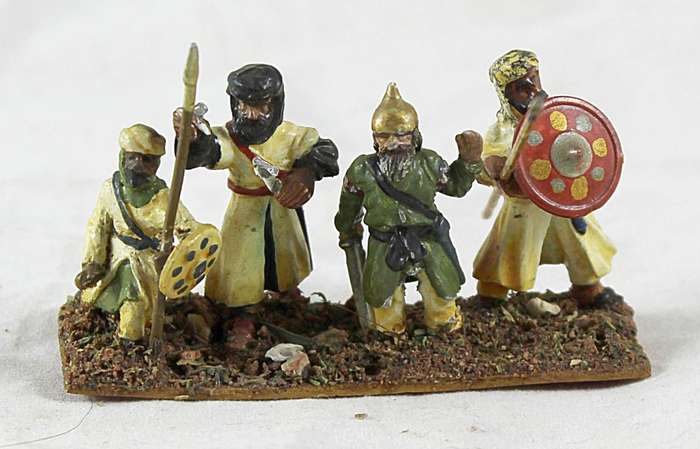 Lead figurine - four Eastern foot soldiers