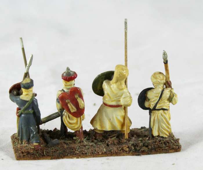 Lead figurine - four Eastern foot soldiers