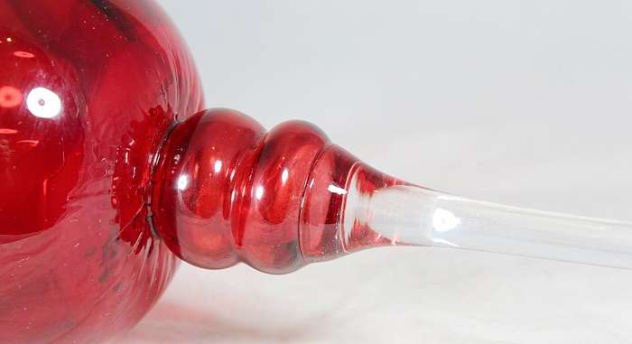 Red glass - bulbous candle holder
