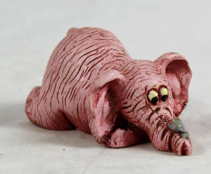 Pink elephant with mouse