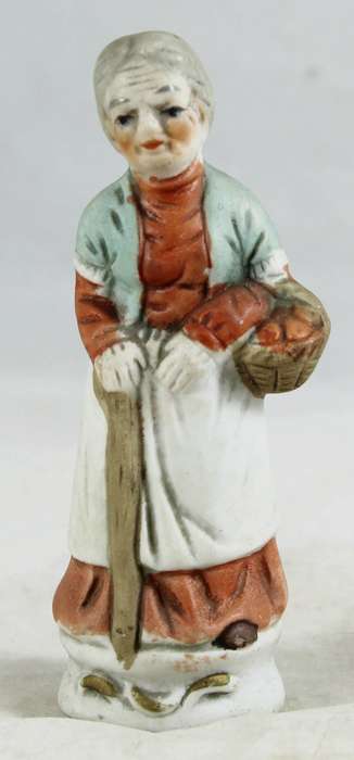 Very old woman carrying a basket