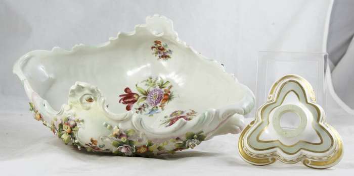 Very old center piece on stand - embossed flowers