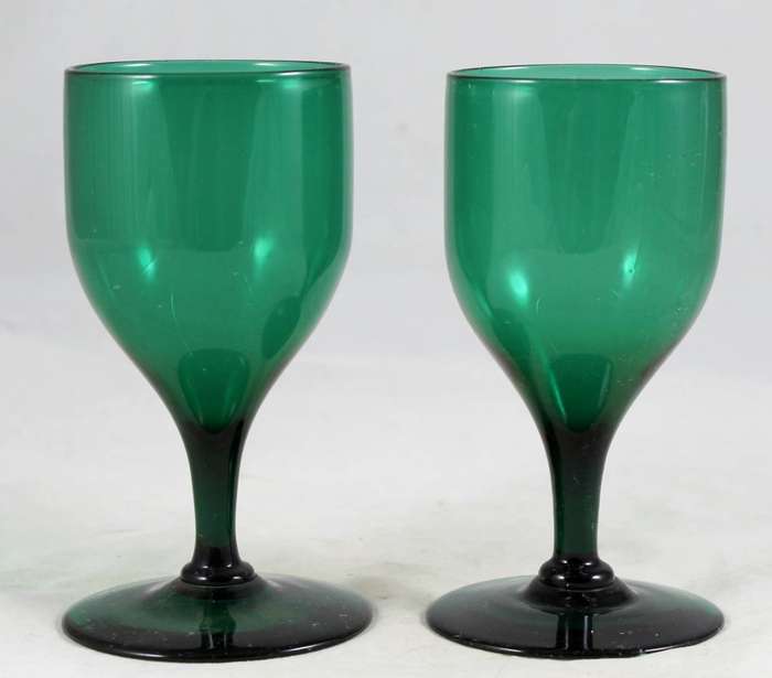 Pair of green stemmed glasses