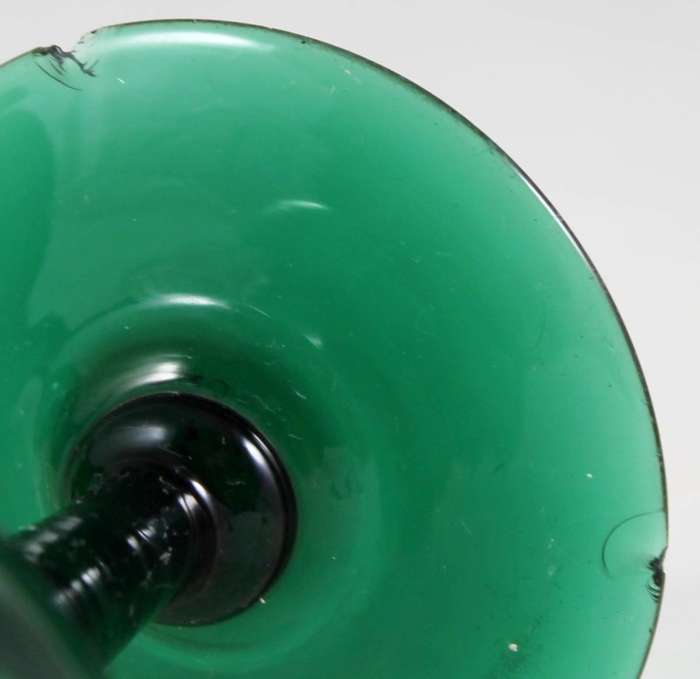 Pair of green stemmed glasses
