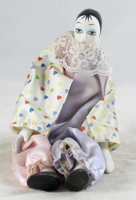 Seated dressed Pierrot