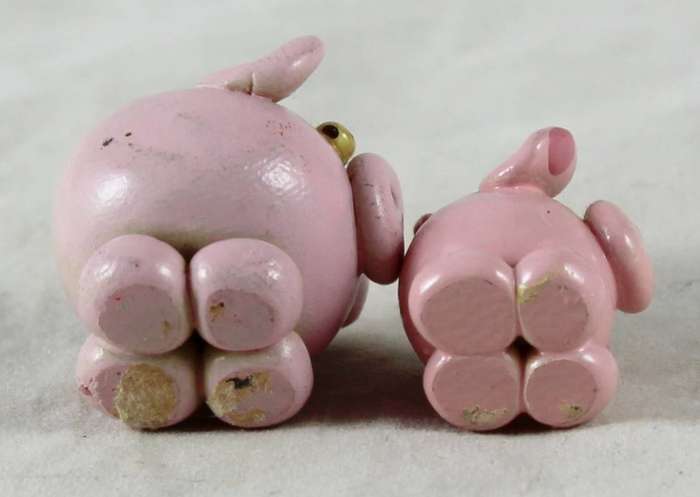 Miniature pair of pink pigs