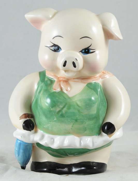 White pig in green dress - money bank
