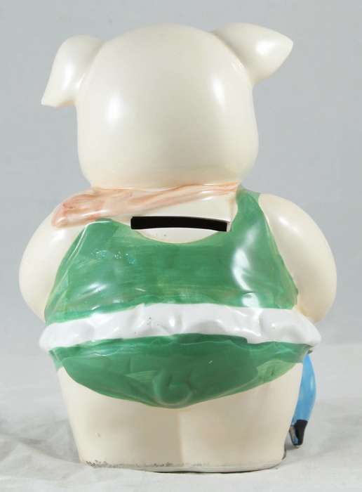 White pig in green dress - money bank