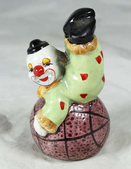 Clown laying on ball