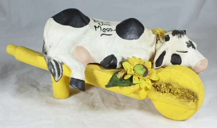 Bless this mess - cow on wheelbarrow
