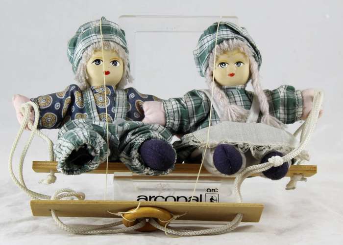 Dolls - boy & girl on swing