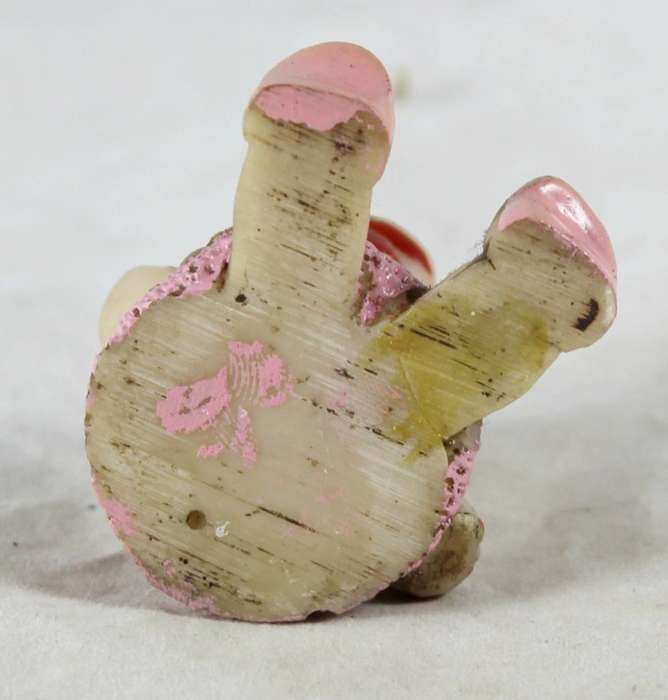 Miniature seated hippo with tutu