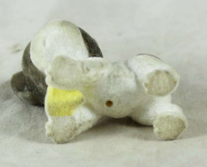 Miniature suede puppy playing