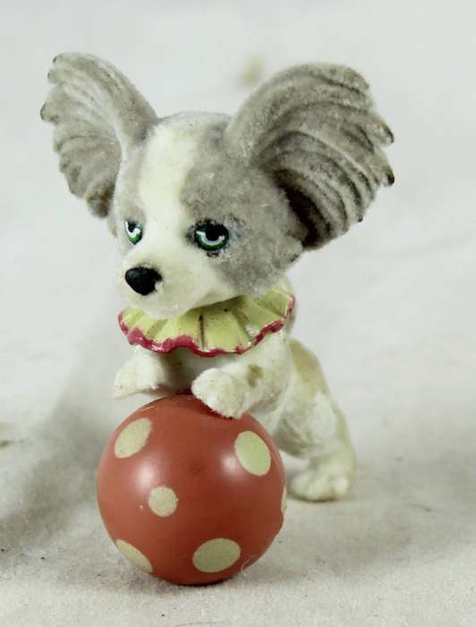 Miniature suede puppy with ball