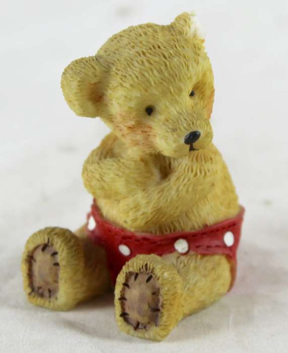 Miniature seated bear