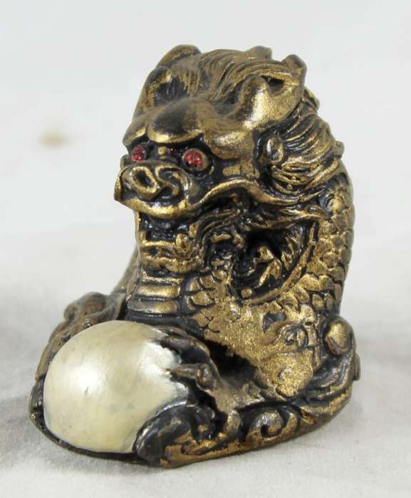 Small gold dragon with crystal ball