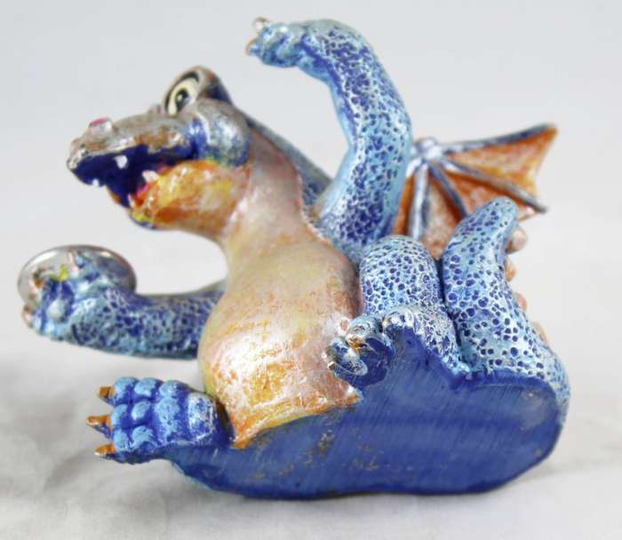Baby dragon with pink crystal