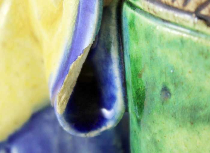 Mud man with big green pot
