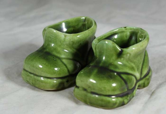 Small pair of green porcelain booties