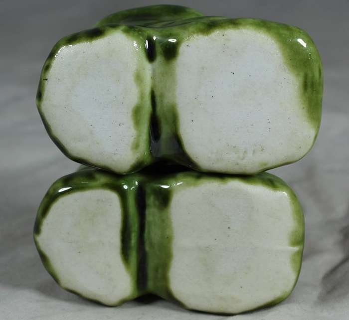 Small pair of green porcelain booties