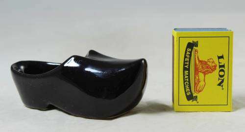 Black shoe figurine