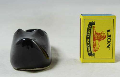 Black shoe figurine