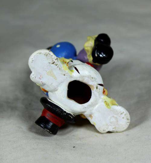 Clown standing on his head