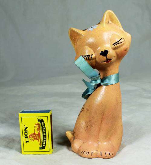 Cat in a blue bow