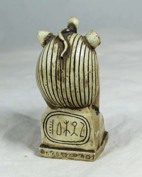 Lion with snake figurine