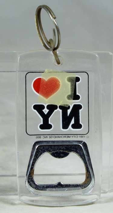 Bottle opener with key ring
