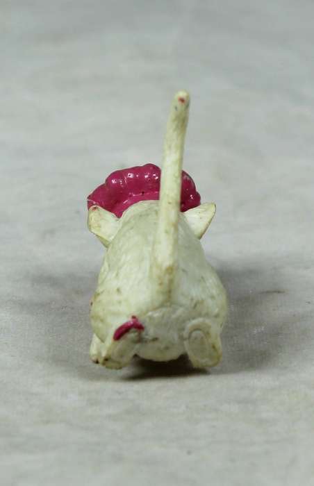 Miniature plastic mouse with a bakers hat