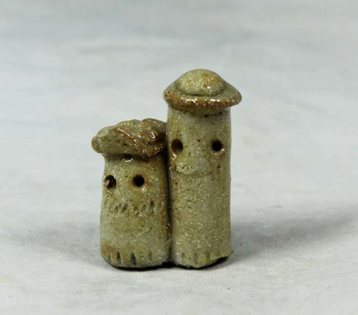 Miniature smiling couple