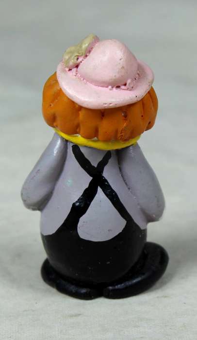 Miniature clown with a pink hat