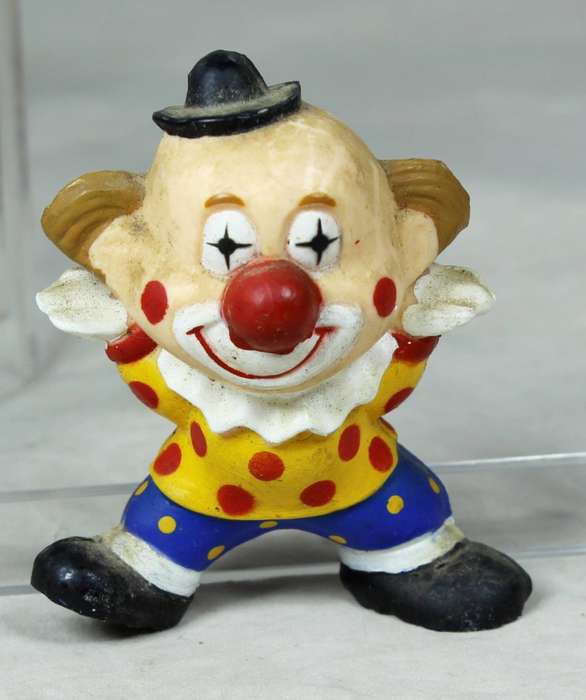 Miniature clown with a happy face