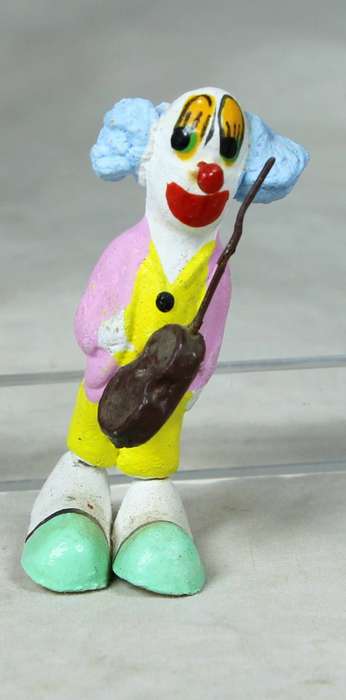 Miniature clown with a violin