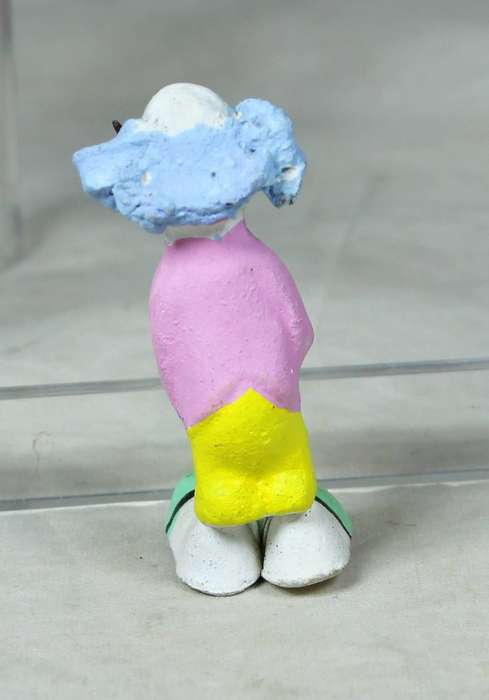 Miniature clown with a violin