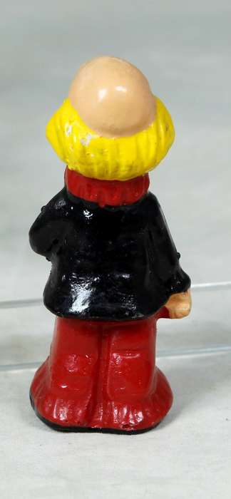 Miniature clown with a blue flower
