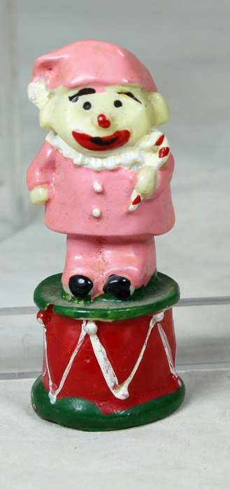 Miniature tramp standing on a drum