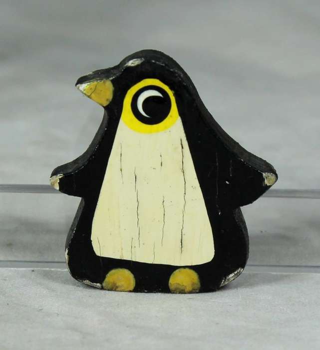 Miniature wooden penguin fridge magnet