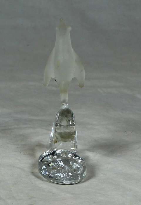 Frosted penguin on a pedestal