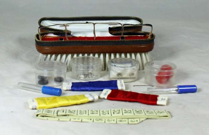 Brush with sewing kit