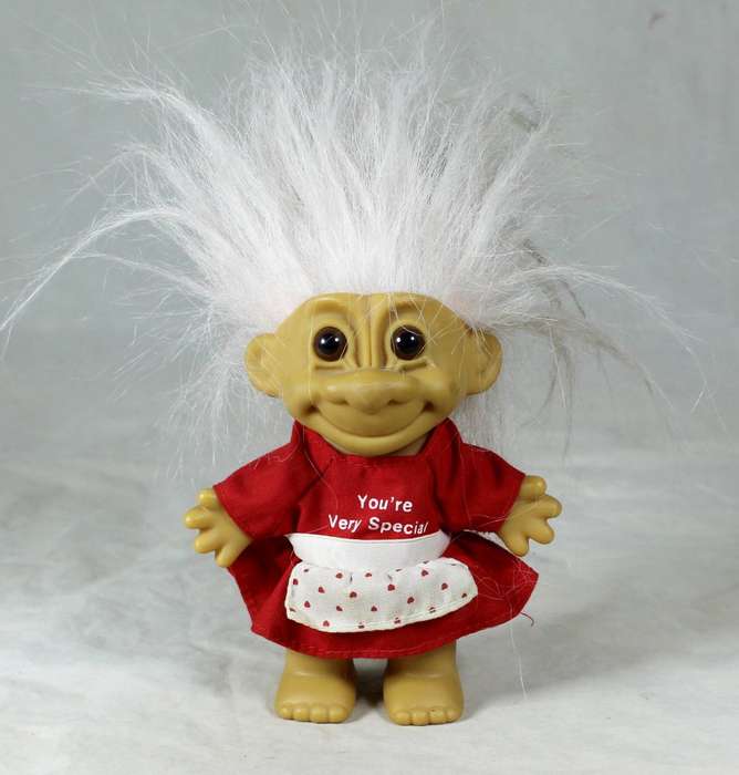 Russ troll doll with a '' you're very special'' red dress