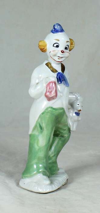 Clown holding a rabbit