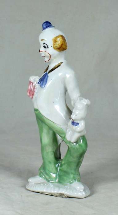 Clown holding a rabbit