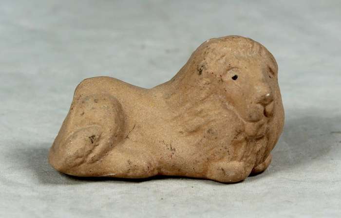 Miniature unglazed lion
