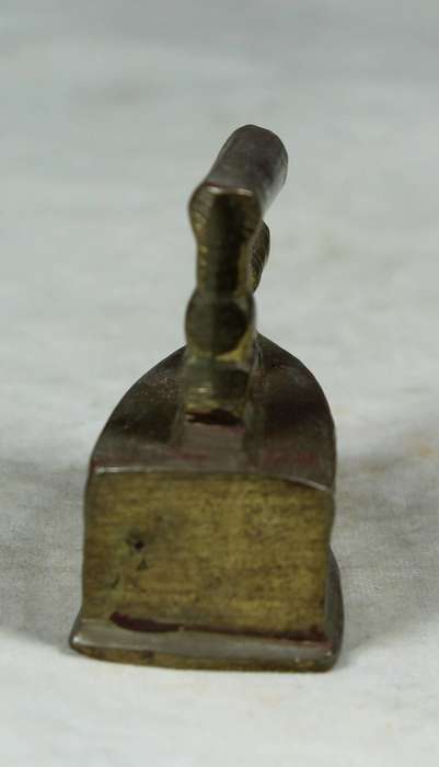Miniature brass coal iron