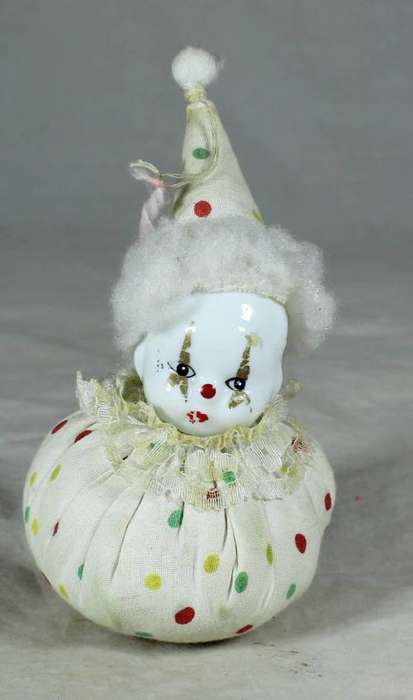 White polka dot clown on a bag