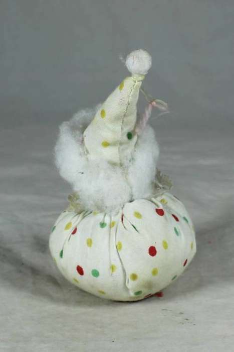 White polka dot clown on a bag